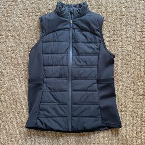 Avia Women’s Quilted Vest, in new condition, black size medium.